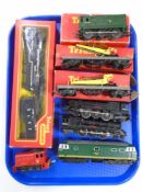 A tray of locomotive engines including Hornby and Triang together with assorted rolling stock.