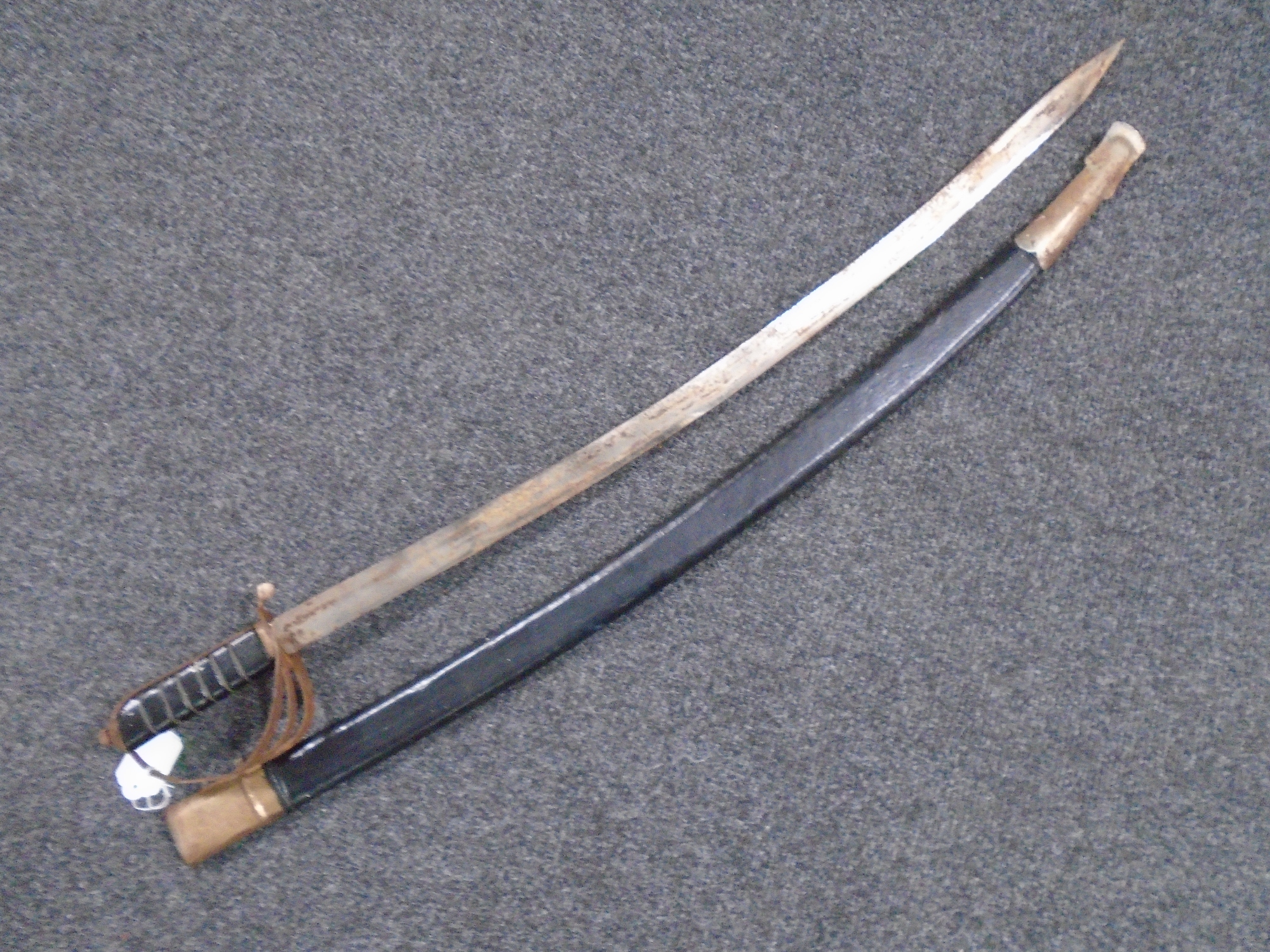 A reproduction Indian sabre.