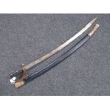 A reproduction Indian sabre.