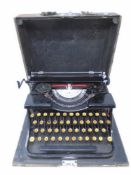 An antique typewriter in carry case