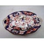 An antique Imari pattern scallop edge dish with Royal Crown Derby lid.