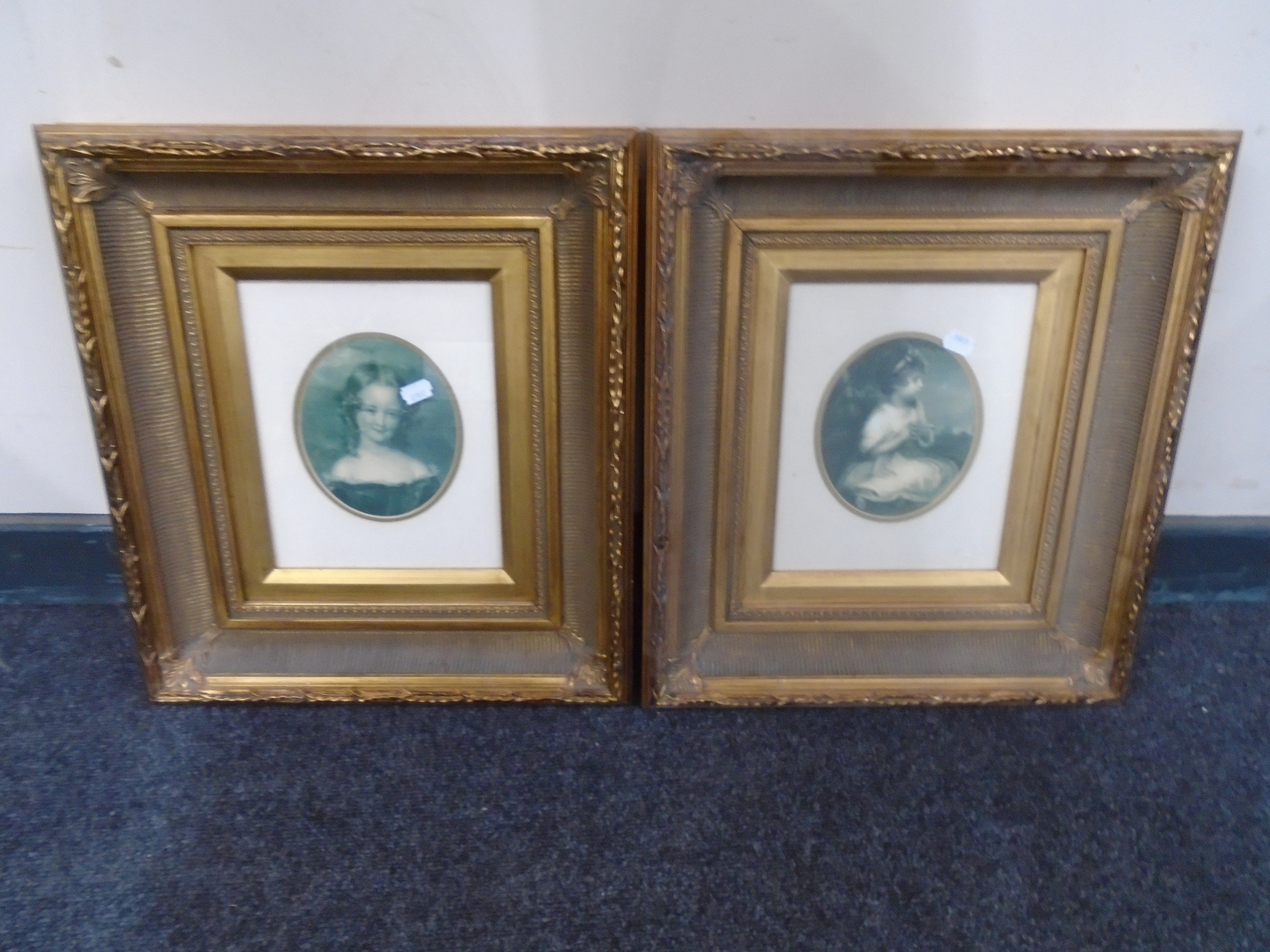 A pair of Victorian style gilt framed prints, portraits.