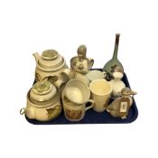 A four-piece Denby tea service, a Spanish lady figure, a china duck ornament,