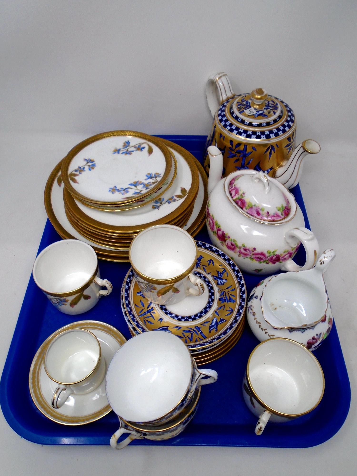 A tray of antique gilded tea china, coffee cups, teapot etc.