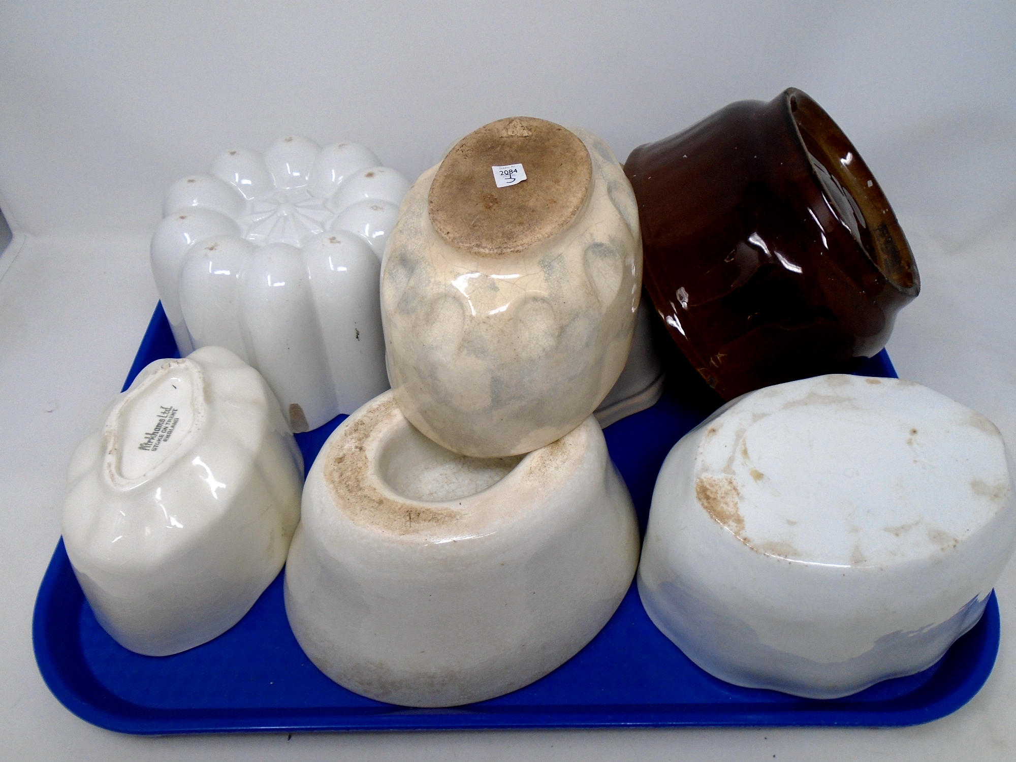A collection of Victorian and later ceramic pie and jelly moulds.