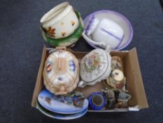 A box containing an encrusted jardiniere, ceramic jar, jug and basin, ceramic figures.