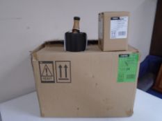A box containing a quantity of Dunelm Acacia pestle and mortar sets.