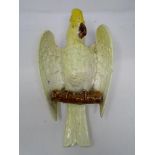 A 19th century Bretby wall pocket in the form of a parrot.