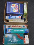 Two boxes of assorted board games.