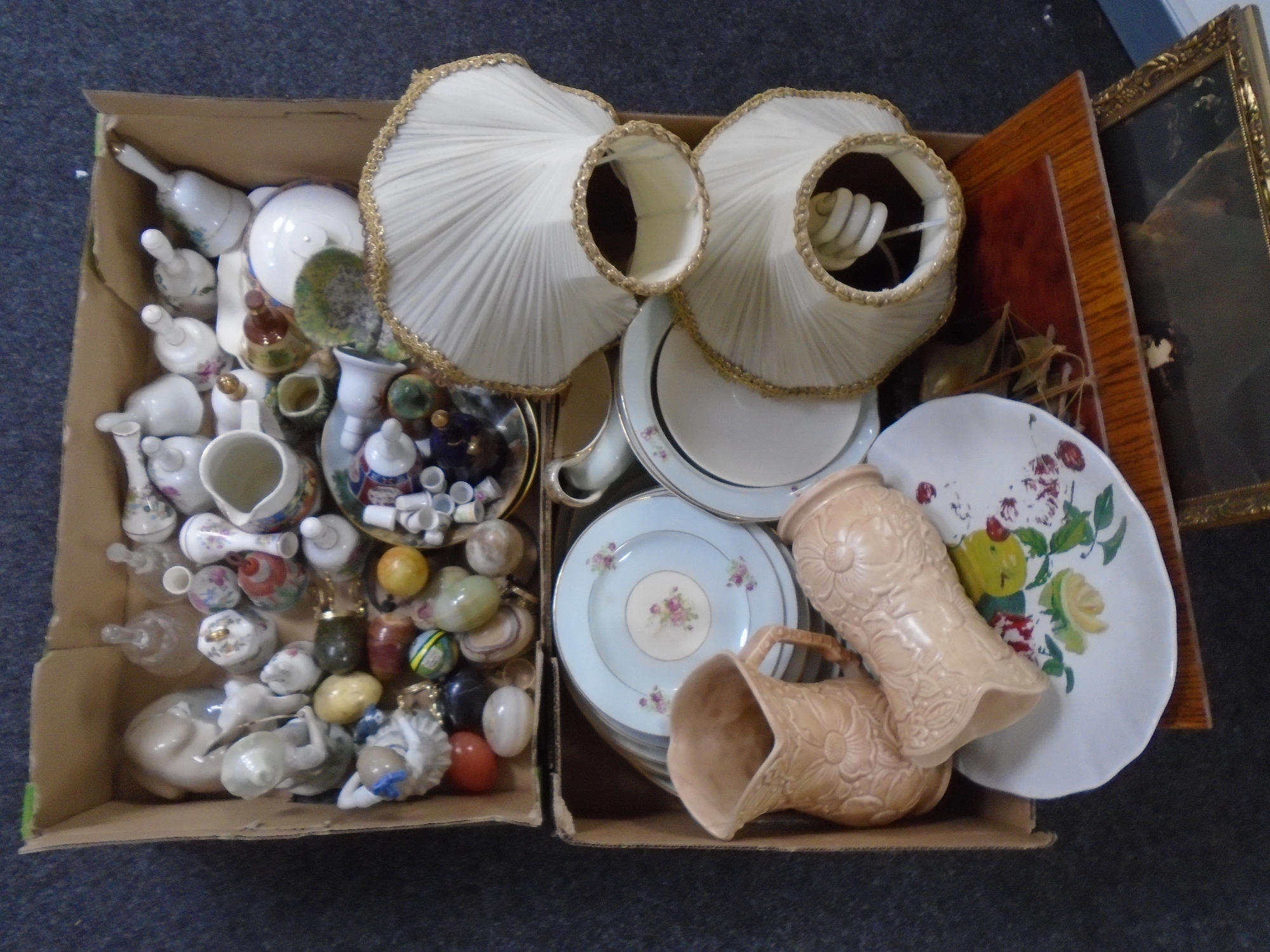 Two crates of china ornaments, plates,