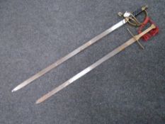Two reproduction dress swords.