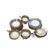 A twenty-piece Royal Albert "Hawthorne" pattern tea service comprising six teacups, six saucers,