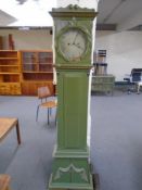 A continental painted longcase clock with circular dial,