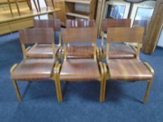 A set of six mid-20th century Tecta Furniture plywood dining chairs.