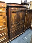 A 19th century mahogany cocktail cabinet fitted with four drawers