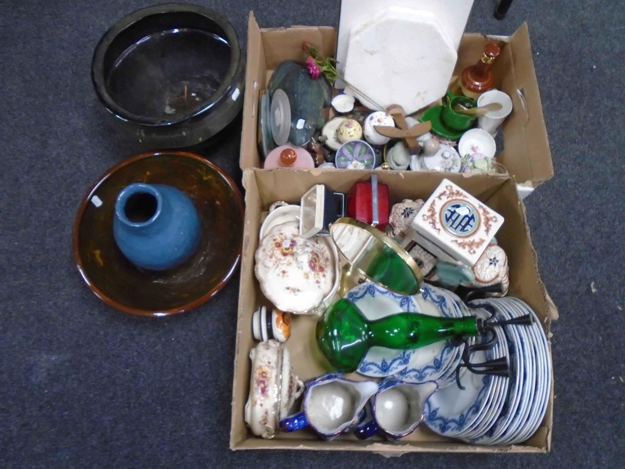 Two boxes of china, a cast metal figure of a toad, an elephant plant stand, glazed pottery bowl etc.