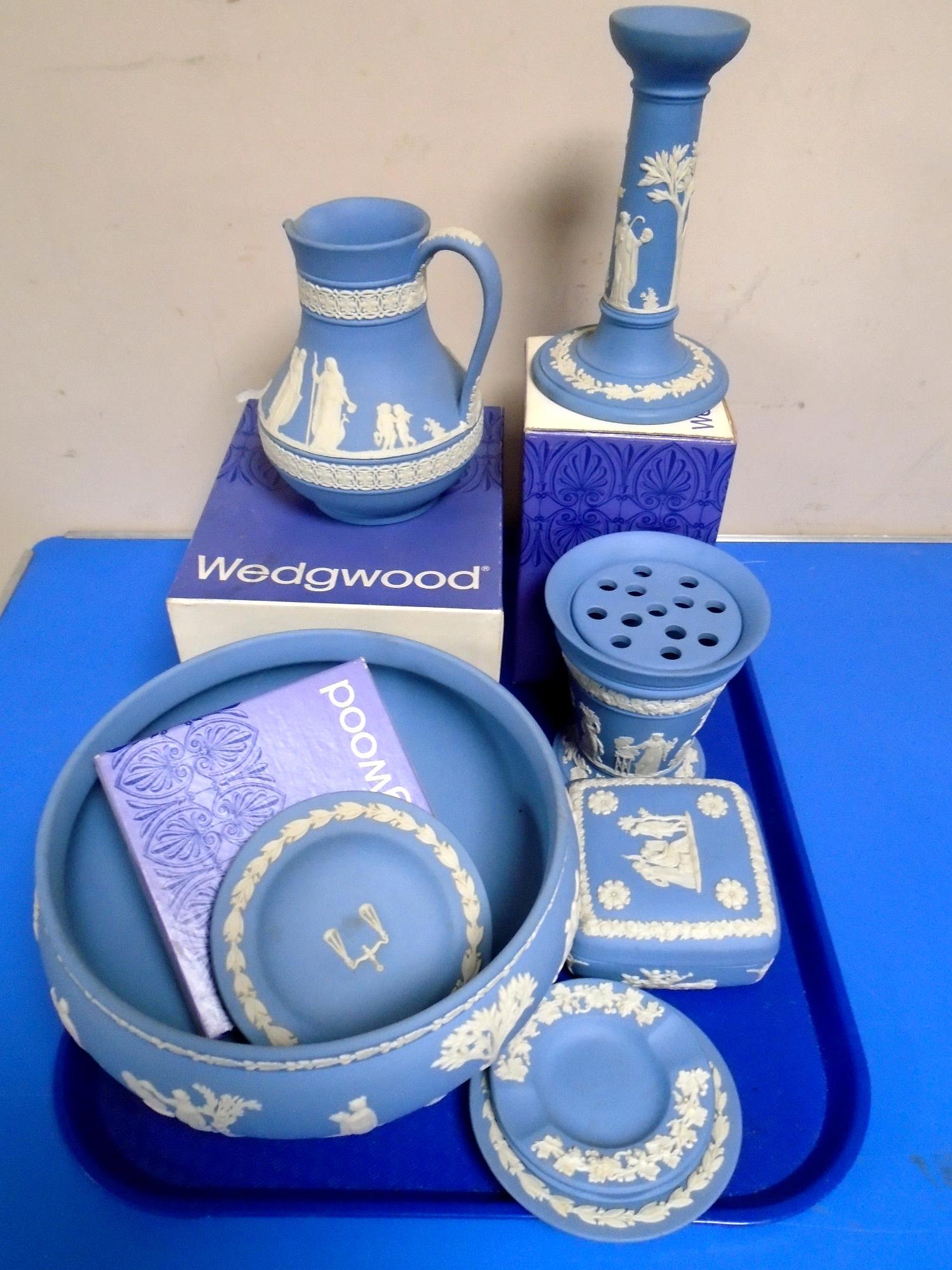 A tray of blue and white Wedgwood Jasperware bowl, jug, candle stick etc.