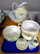 A six part Edwardian transfer printed toilet set together with a further chamber pot.