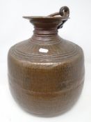 A large copper pot.