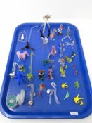 A tray of miniature glass animal ornaments,