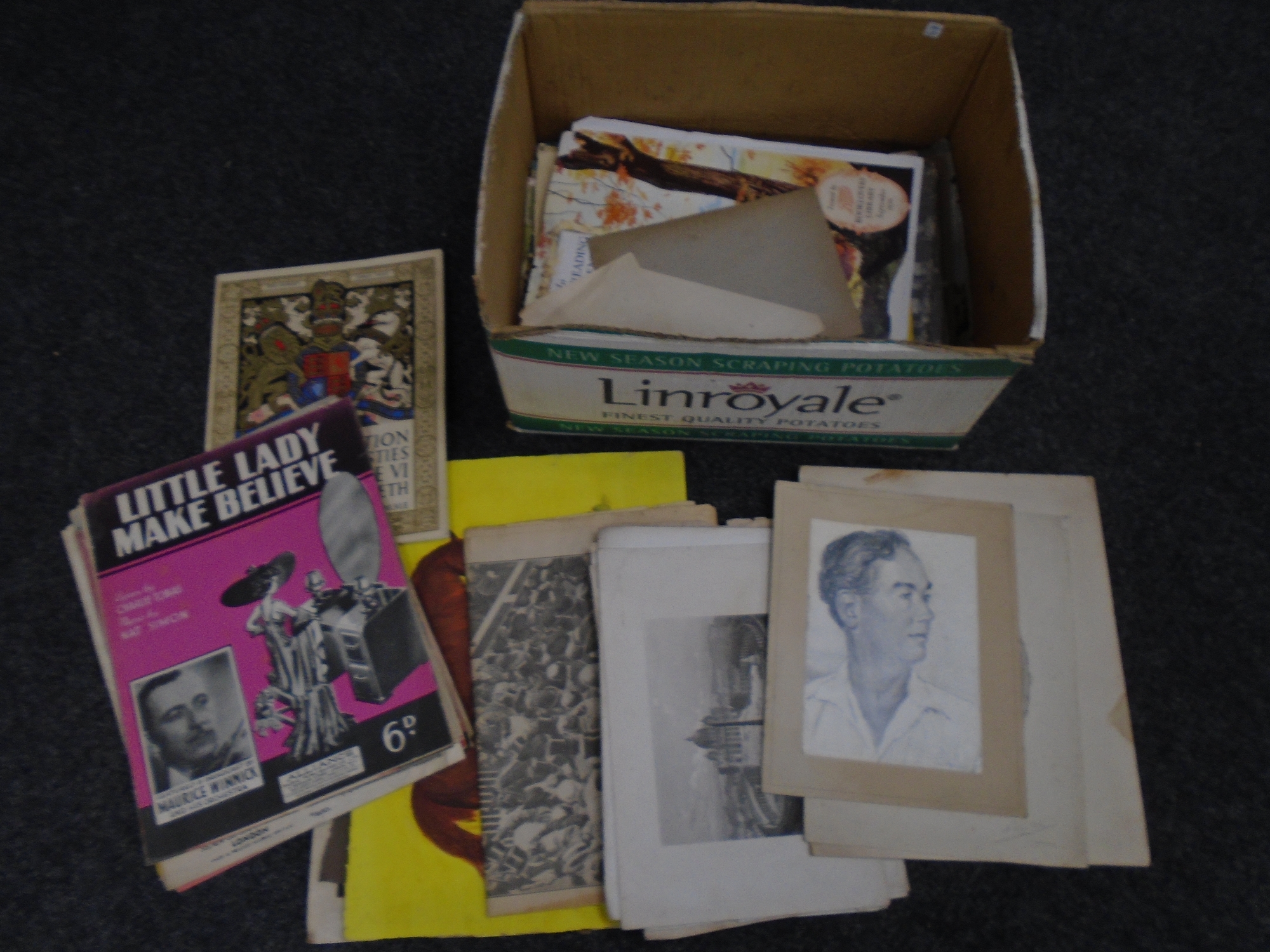 A box of pictures, sketches, watercolours and ephemera.