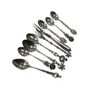 A group of continental white metal spoons and forks, some stamped 800, 835.