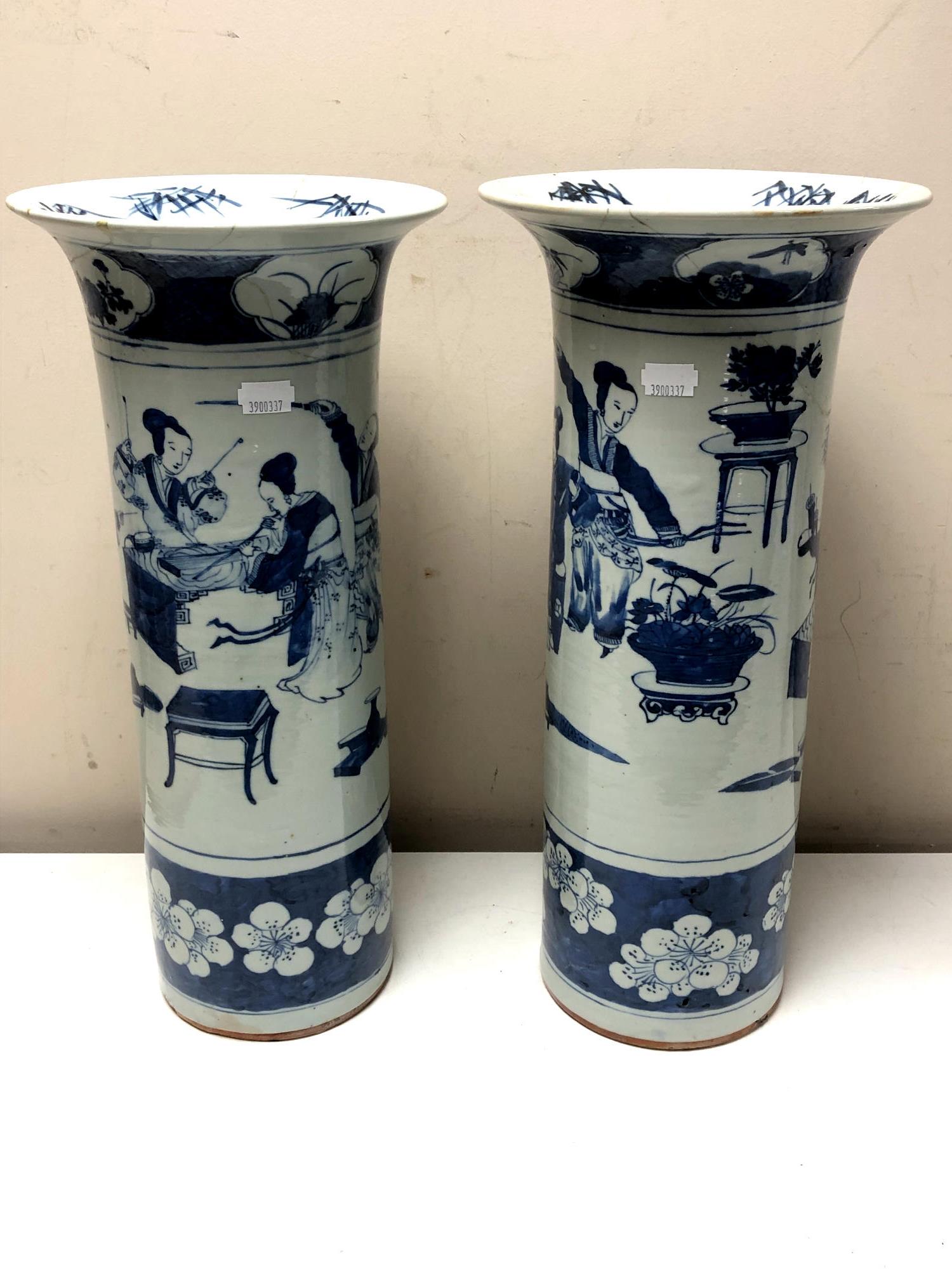 A large pair of 19th century Chinese blue and white vases (height 43.5cm).