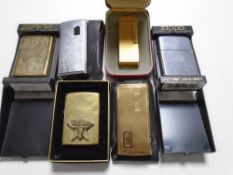 Six lighters in cases and pouches including Zippo, Dunhill, Ronson.