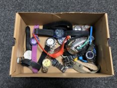 A box containing a large quantity of wrist watches (Q)