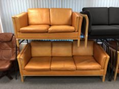 A late 20th century Scandinavian three seater and two seater settee
