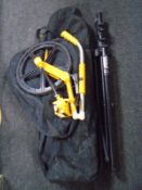 A pair of Gorilla tripod stands in carry bag together with a trundle wheel in carry bag.