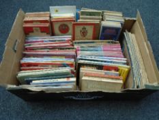 A box of vintage and later OS maps and travel guides
