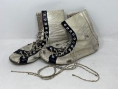 A pair of mid 20th century white leather wrestling boots, size 9.