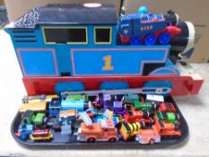 A tray containing a quantity of Thomas and Friends die cast and plastic trains together with an