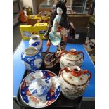 A tray of Oriental ceramics including Japanese geisha figure, Imari dish etc.
