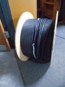 A spool of Leviton black optical fibre cable.