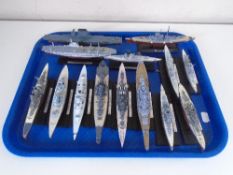 A tray of model war ships