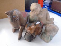 Four wooden figures