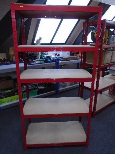 A five tier red metal shelving unit.