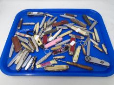 A collection of pocket knives and pen knives