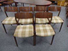 A set of six mid century Danish rosewood dining chairs in checkered fabric