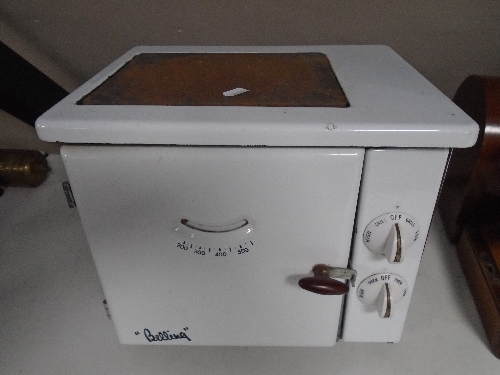 A vintage Belling white enamel table oven.