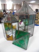 Three leaded glass terrariums.