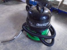 A Numatic George vacuum.