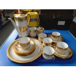 A tray of hand painted golden lustre Thai coffee china