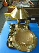 A tray containing an antique brass comport, brass candle sticks etc.