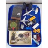 A tray of die cast model vehicles, binoculars, hair trimmers,