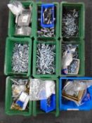 Nine plastic storaage boxes containing assorted metal screws, fittings, socket face plates,