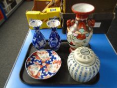 A tray of Japanese blue and white vases, Imari pattern dish, Chinese ginger jar and cover etc.
