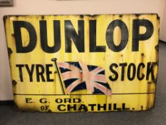 An early 20th century rare enamel sign : "Dunlop Tyre Stock", 185 cm x 123 cm.